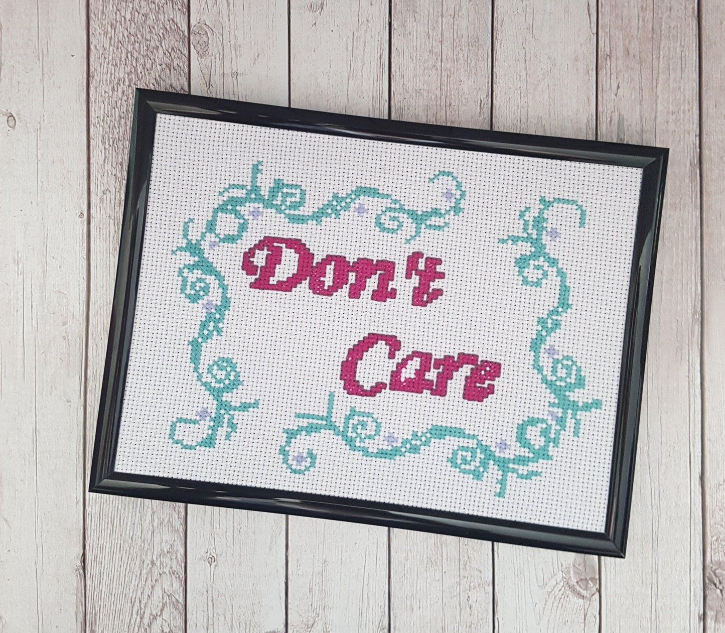 Don't Care completed cross stitch quote - Thistleflat Crafts