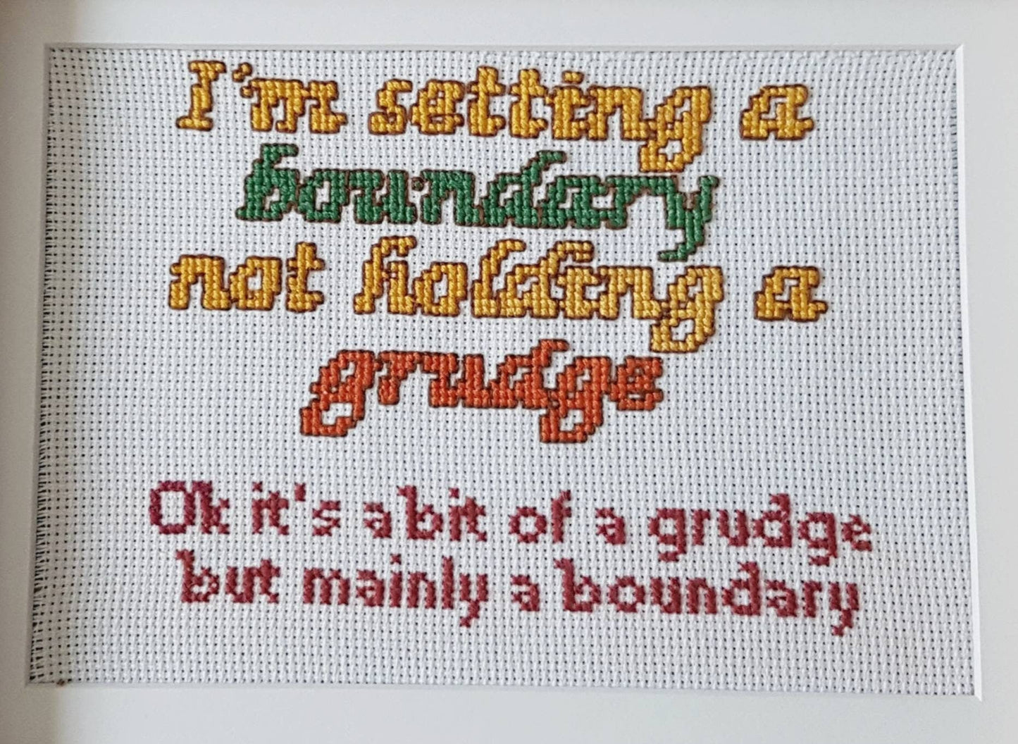Setting a boundary not holding a grudge, completed cross stitch quote - Thistleflat Crafts