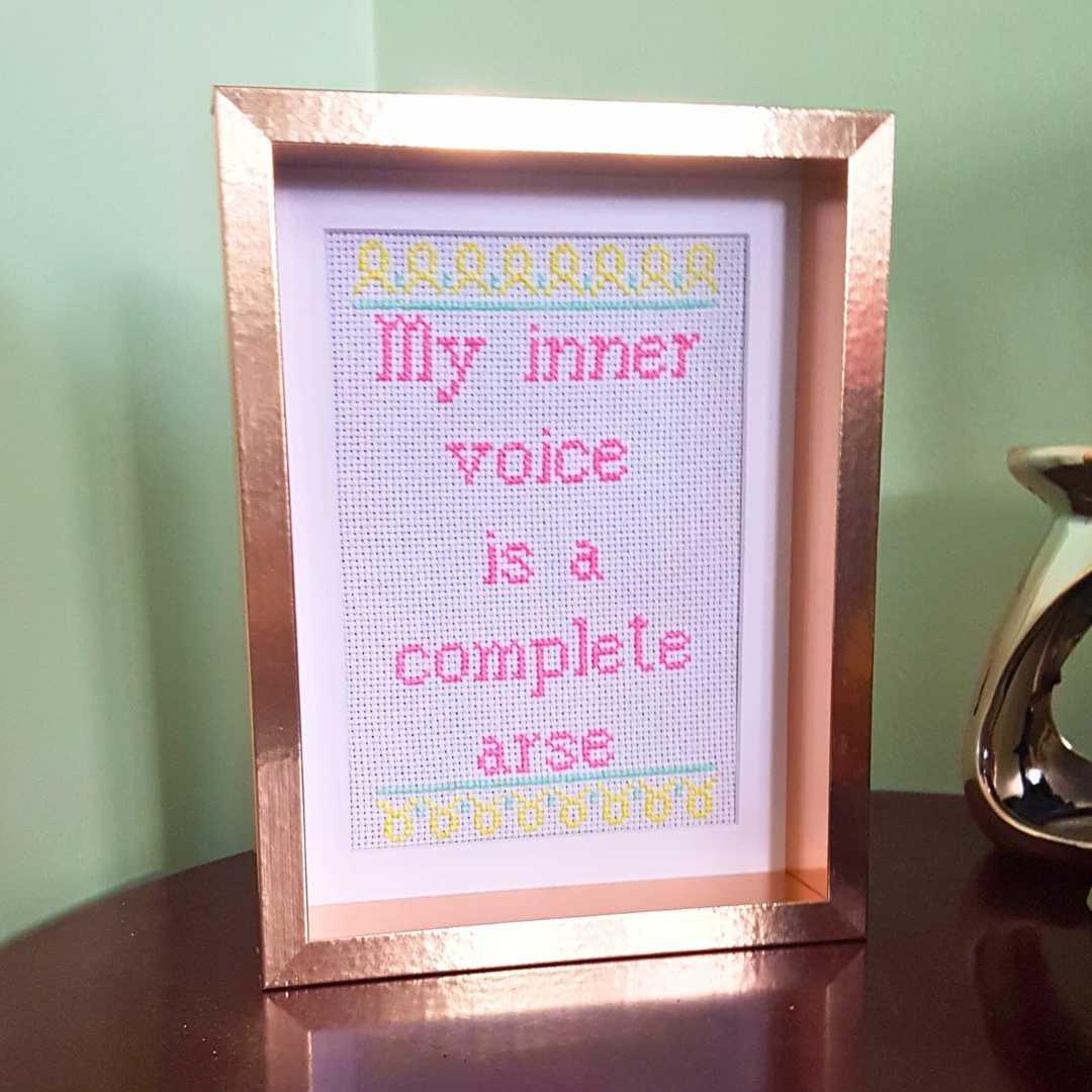 My inner voice is a complete arse, completed cross stitch quote - Thistleflat Crafts
