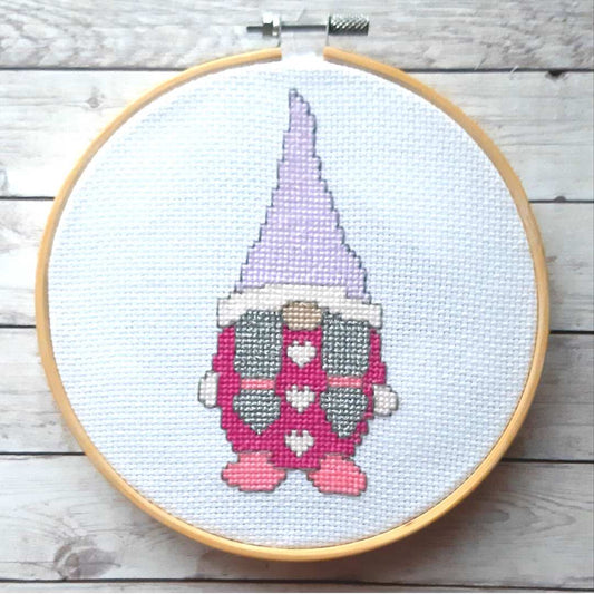 Pink girl gonk, completed cross stitch - Thistleflat Crafts
