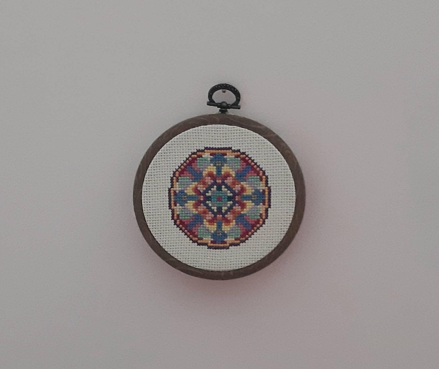 Mandala design, completed cross stitch