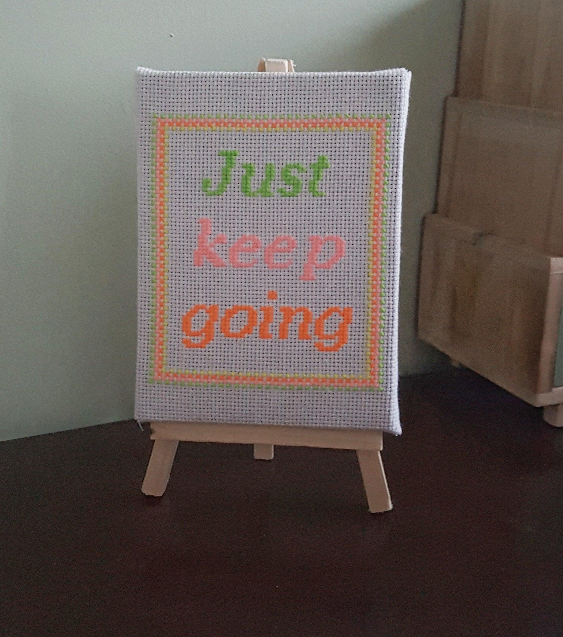 Just keep going, completed cross stitch quote - Thistleflat Crafts