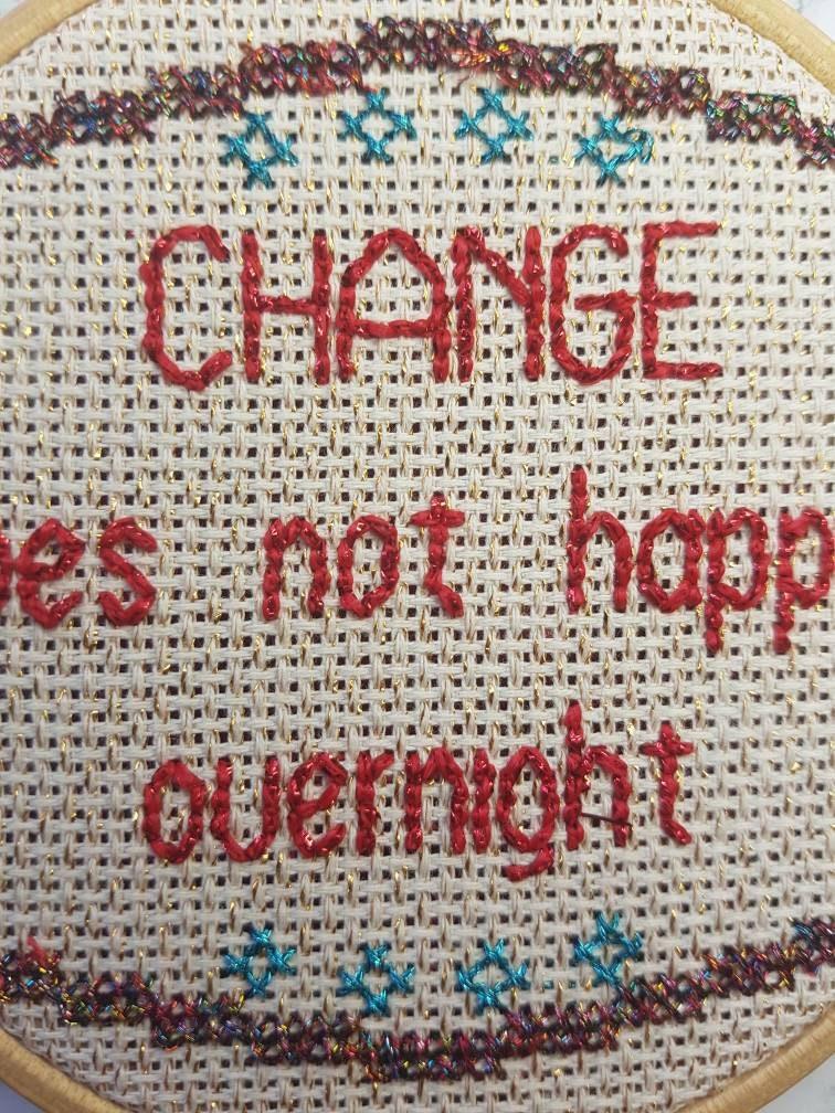 Change does not happen overnight, completed cross stitch quote