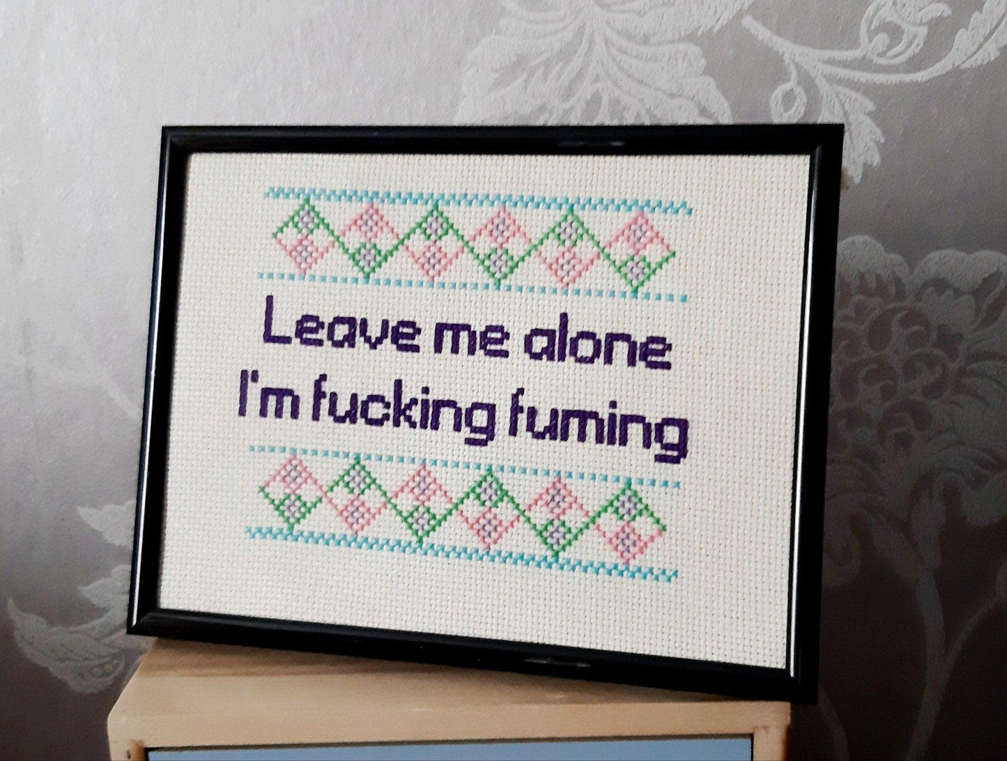 Leave me alone I'm fucking fuming completed cross stitch displayed in living room setting, gift ideas